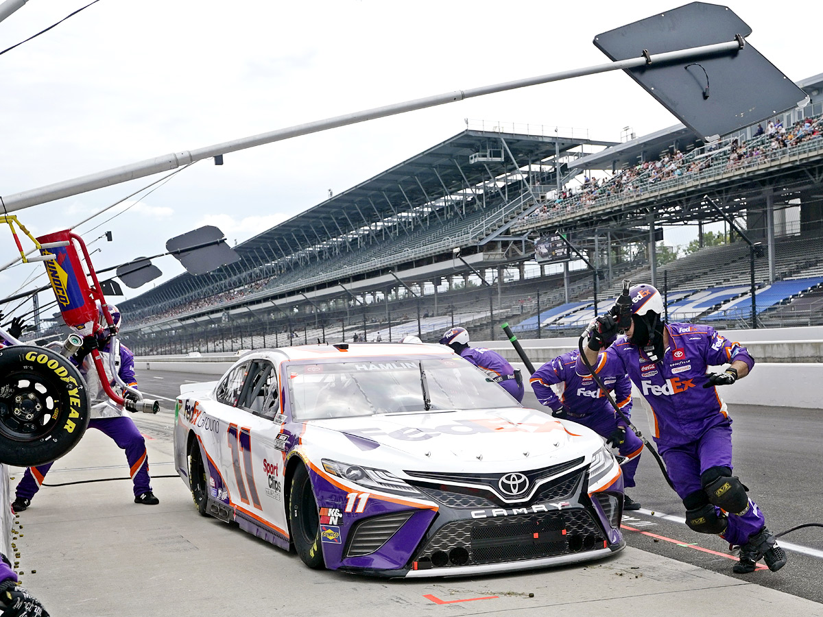 AJ Allmendinger celebrates after winning a NASCAR Series auto race Photo Gallery - Sakshi11