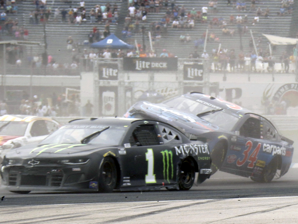 AJ Allmendinger celebrates after winning a NASCAR Series auto race Photo Gallery - Sakshi17