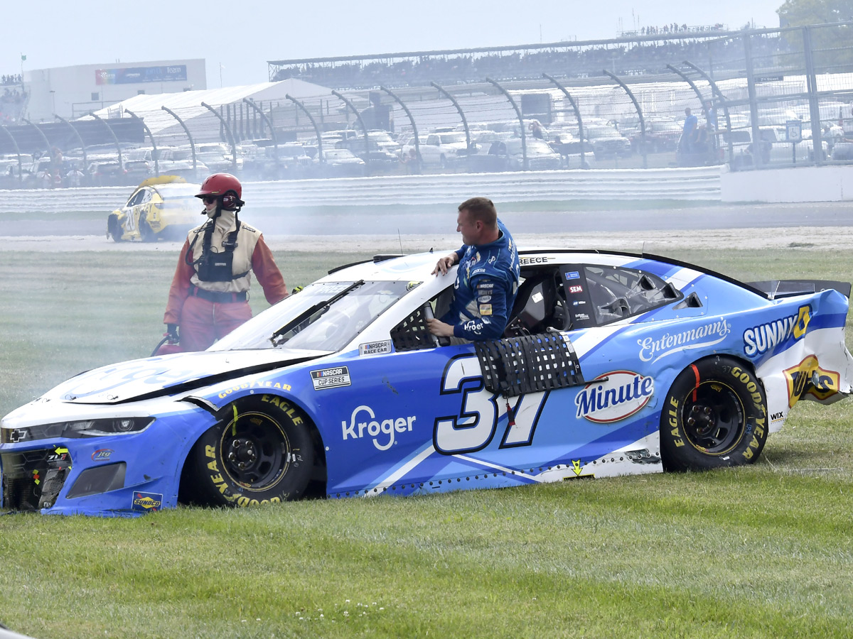 AJ Allmendinger celebrates after winning a NASCAR Series auto race Photo Gallery - Sakshi18