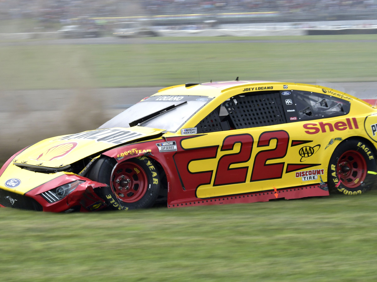 AJ Allmendinger celebrates after winning a NASCAR Series auto race Photo Gallery - Sakshi6