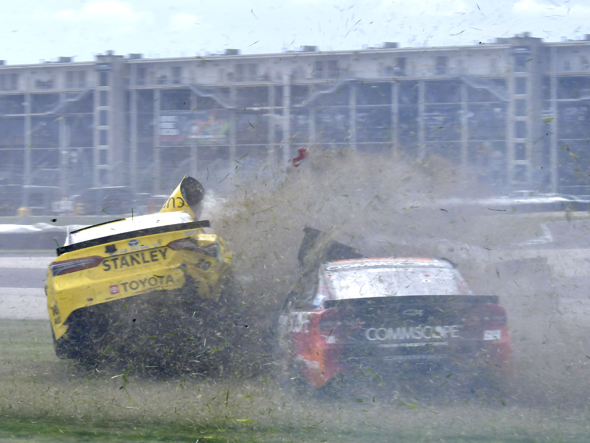 AJ Allmendinger celebrates after winning a NASCAR Series auto race Photo Gallery - Sakshi1