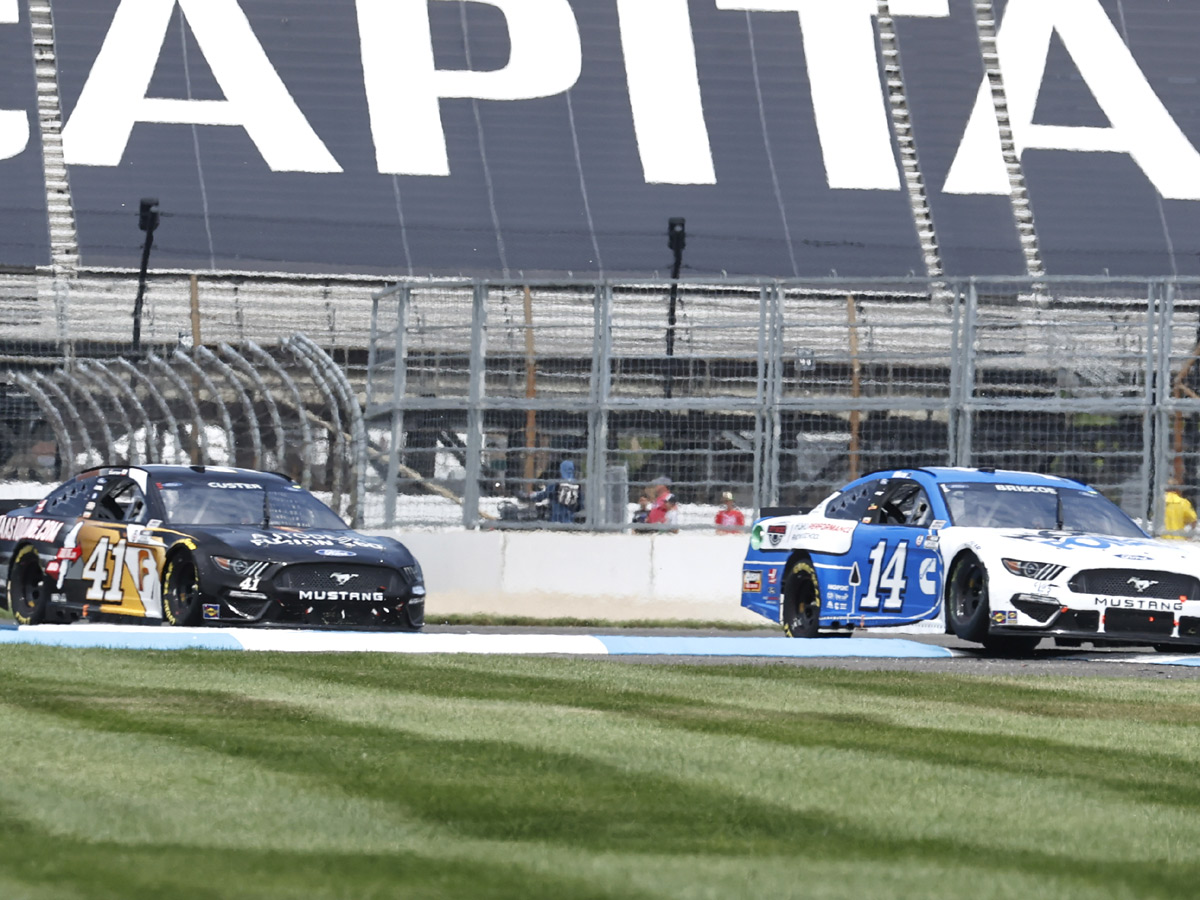 AJ Allmendinger celebrates after winning a NASCAR Series auto race Photo Gallery - Sakshi8