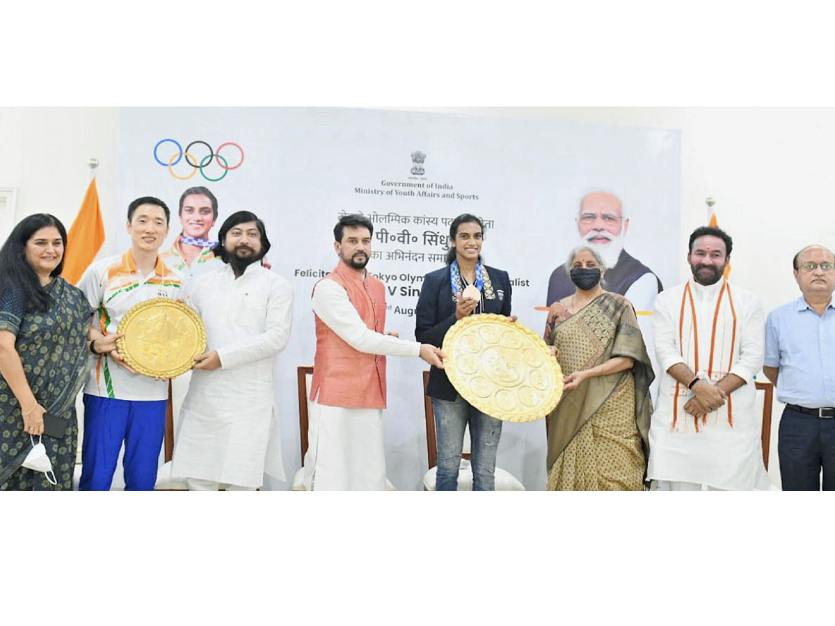 PV Sindhu receives grand welcome at Delhi airport Photo Gallery - Sakshi10