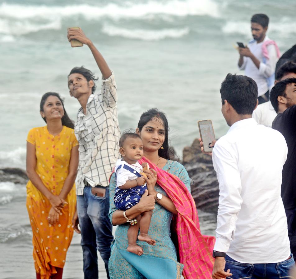 Tourists Rush at Rushikonda Beach Visakhapatnam - Sakshi10