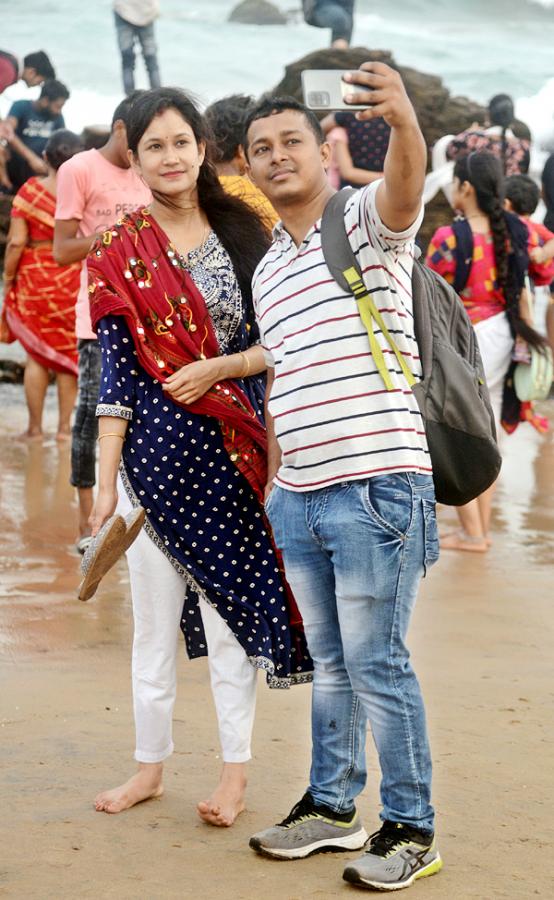 Tourists Rush at Rushikonda Beach Visakhapatnam - Sakshi11
