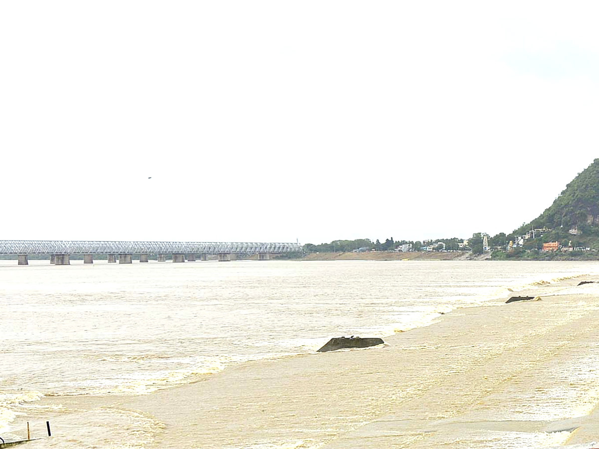 Huge Flood hit In Prakasam Barrage - Sakshi11