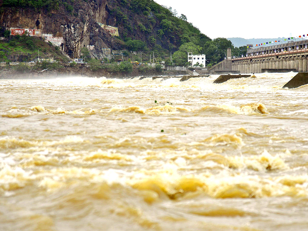 Huge Flood hit In Prakasam Barrage - Sakshi2