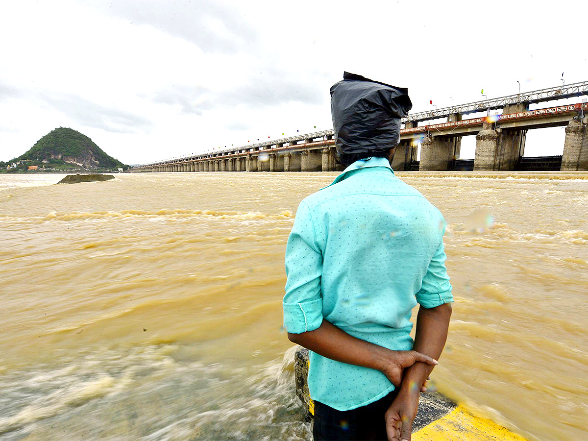 Huge Flood hit In Prakasam Barrage - Sakshi3