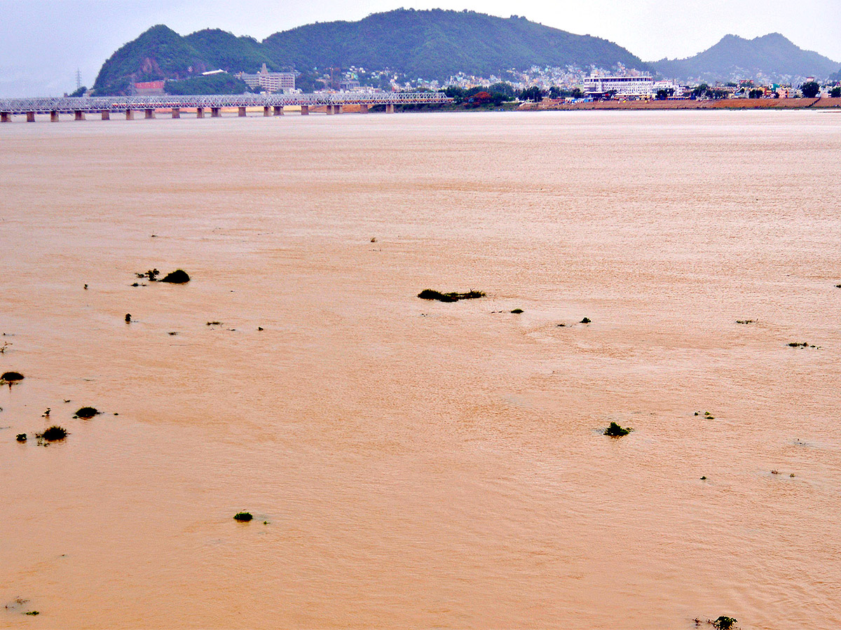 Huge Flood hit In Prakasam Barrage - Sakshi6