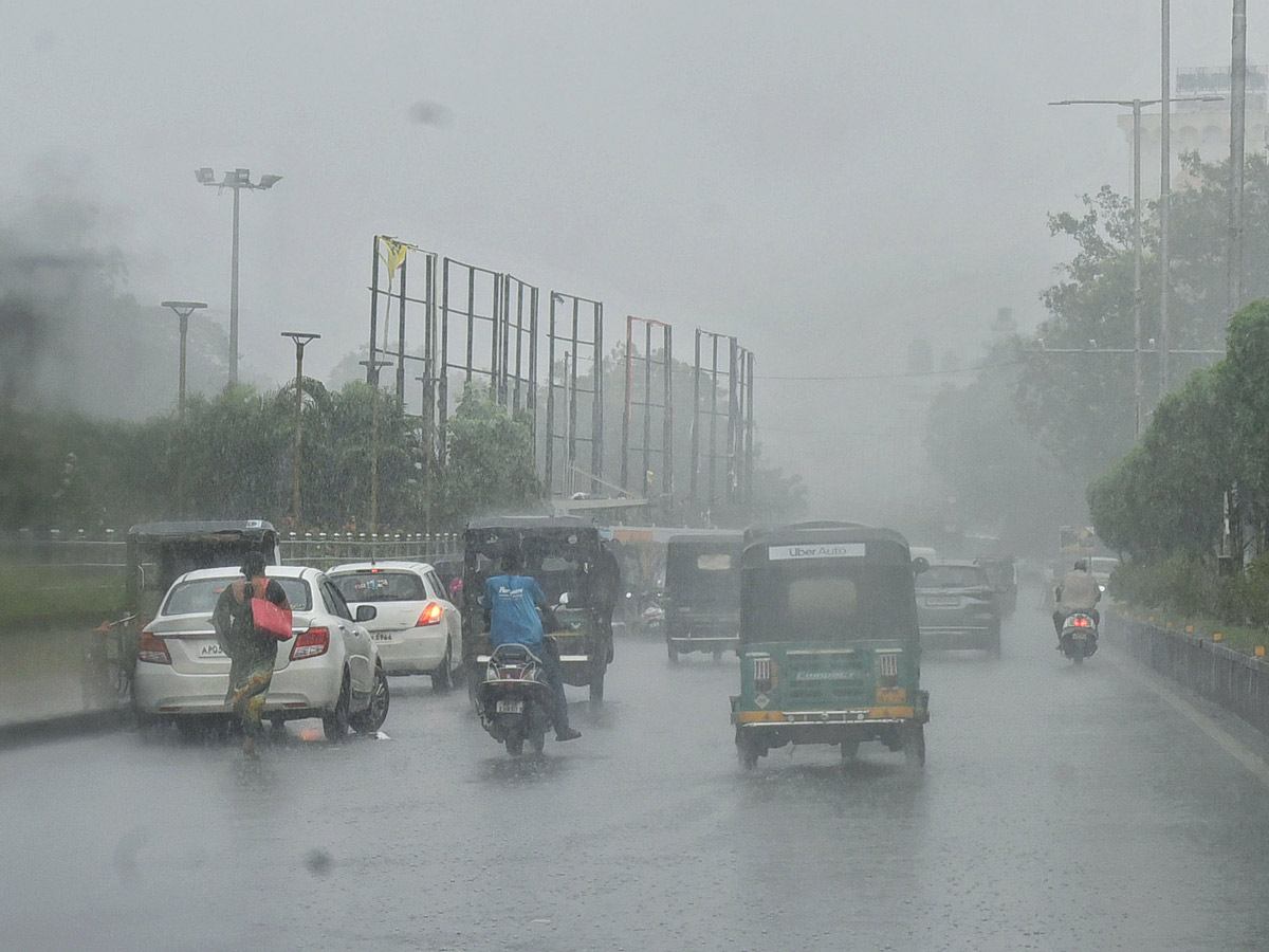 Heavy rains and thunderstorm in both Telugu states - Sakshi12