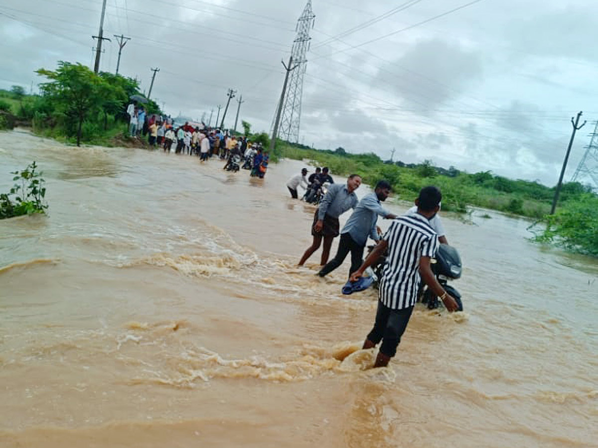 Heavy rains and thunderstorm in both Telugu states - Sakshi27