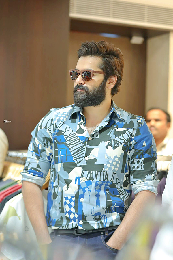 Hero Ram Pothineni Super Stylish Entry At Vijayawada - Sakshi24