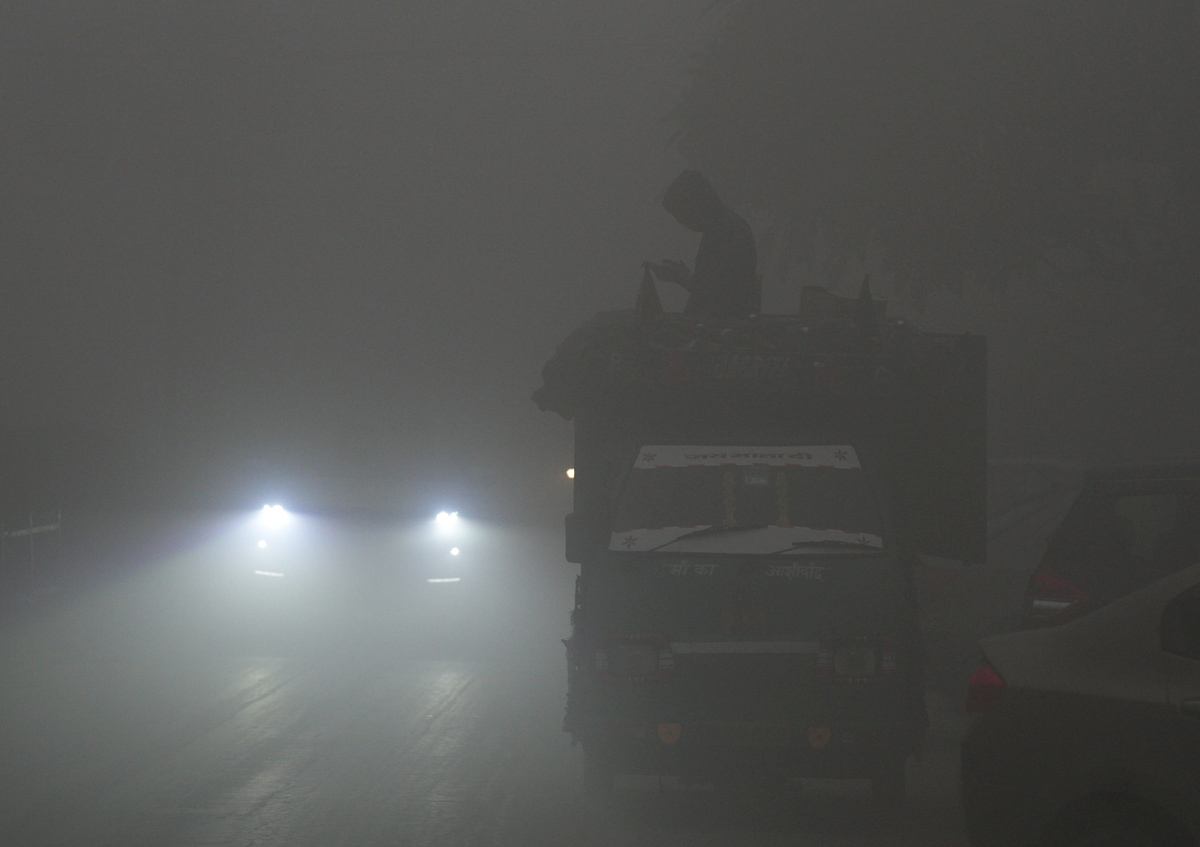 Cold wave continues in Delhi - Sakshi14