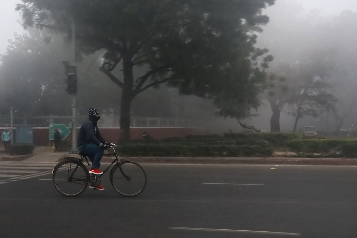Cold wave continues in Delhi - Sakshi3