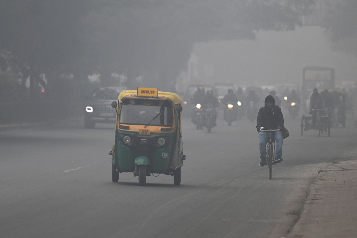 Cold wave continues in Delhi - Sakshi4