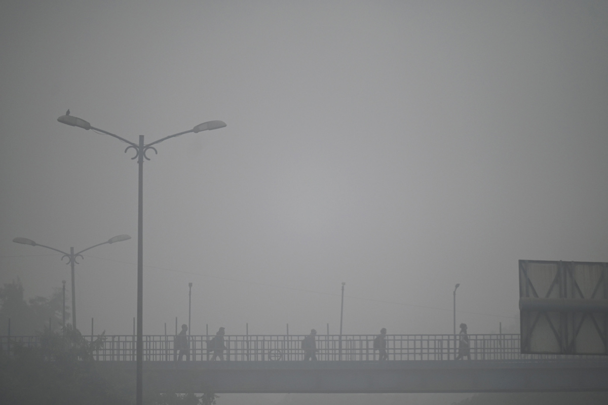 Cold wave continues in Delhi - Sakshi6