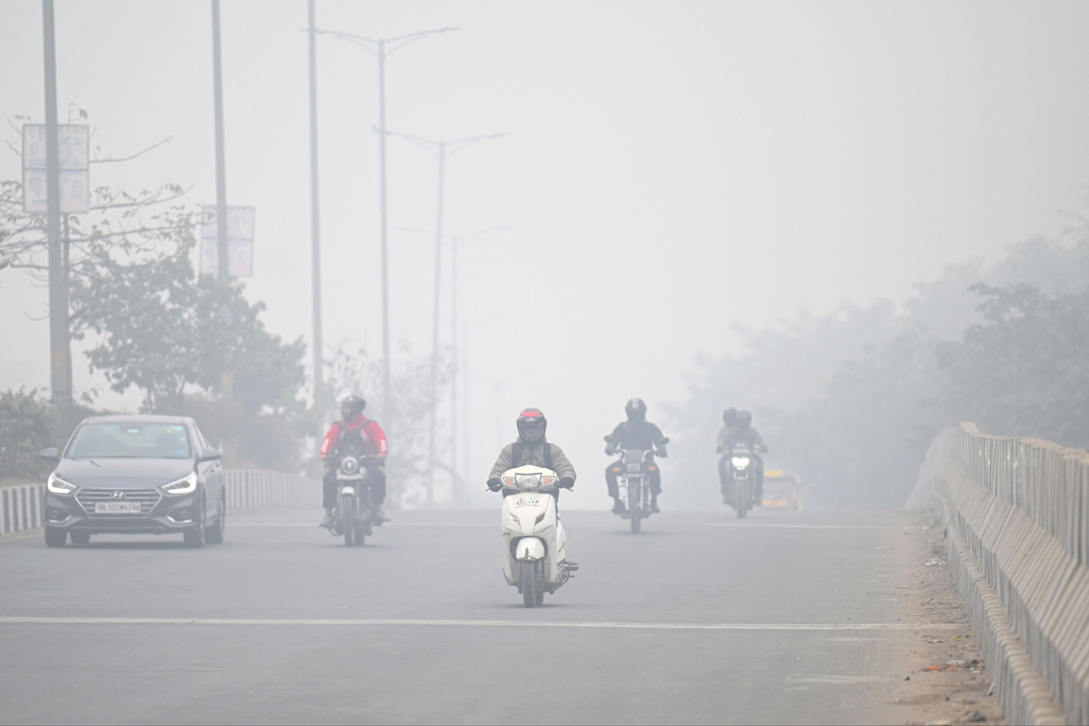 Cold wave continues in Delhi - Sakshi7