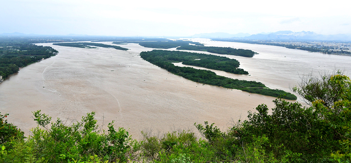 Andhra Pradesh: Huge inflows reported at Prakasam Barrage Photos - Sakshi14