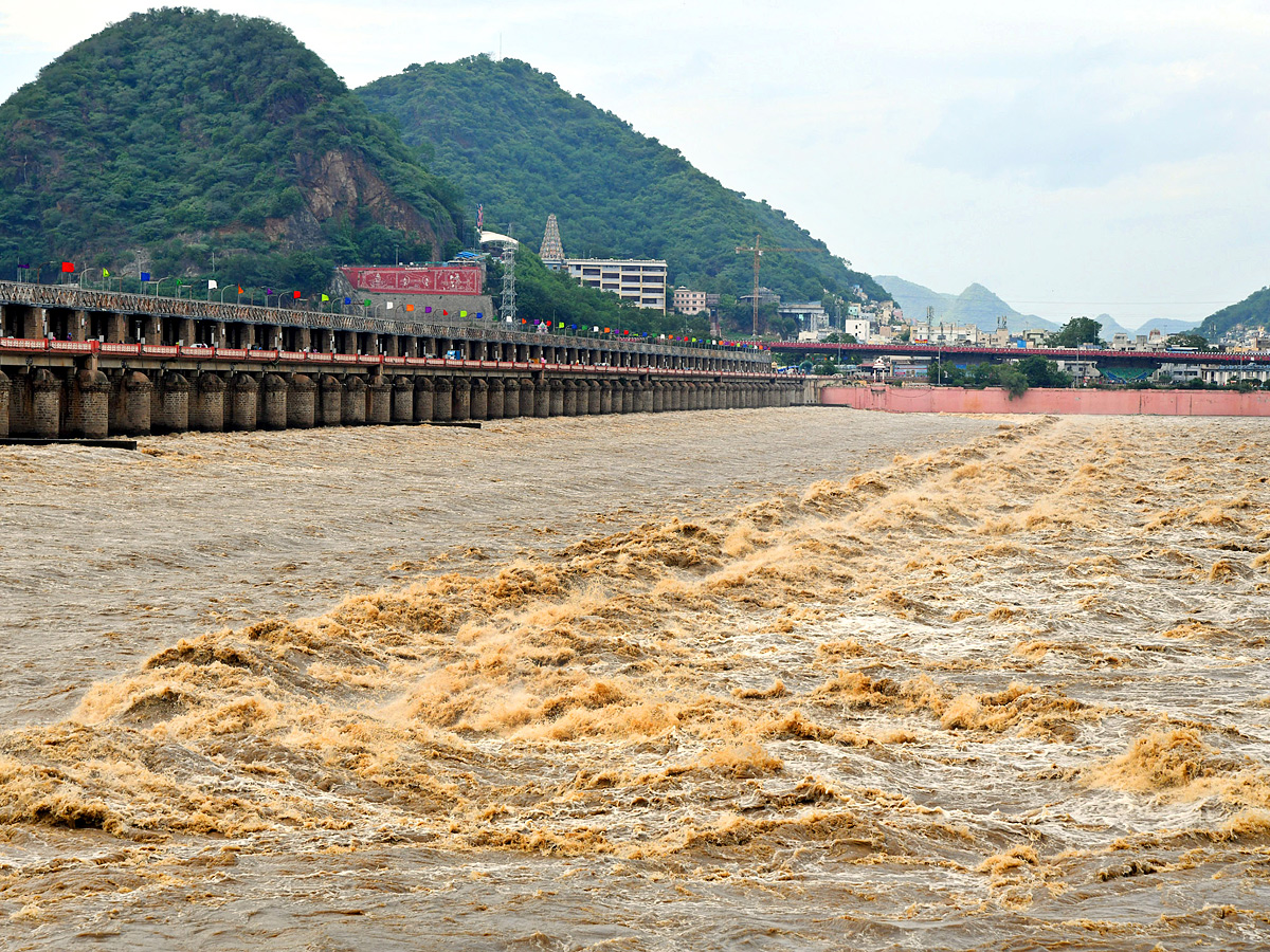 Andhra Pradesh: Huge inflows reported at Prakasam Barrage Photos - Sakshi2