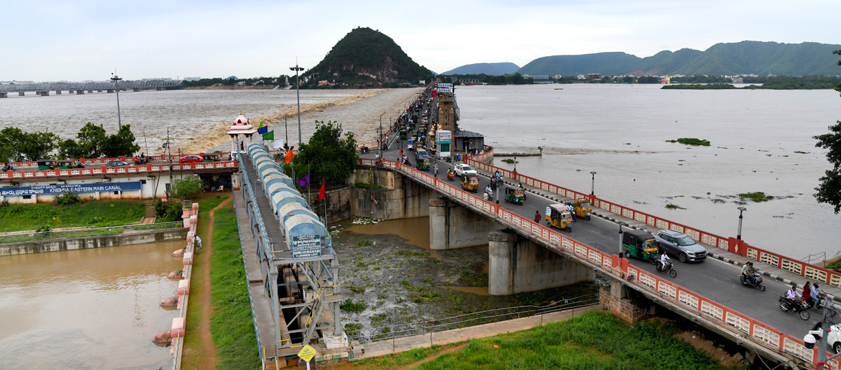 Andhra Pradesh: Huge inflows reported at Prakasam Barrage Photos - Sakshi19