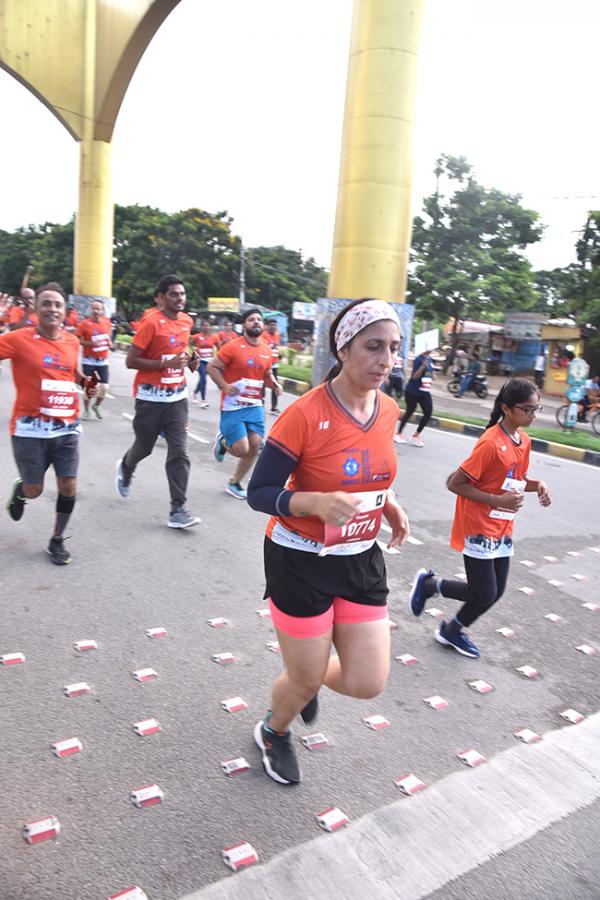 The half marathon ended at Gachibowli Stadium - Sakshi13