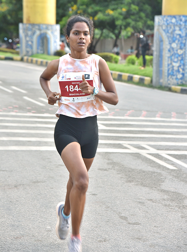 The half marathon ended at Gachibowli Stadium - Sakshi19