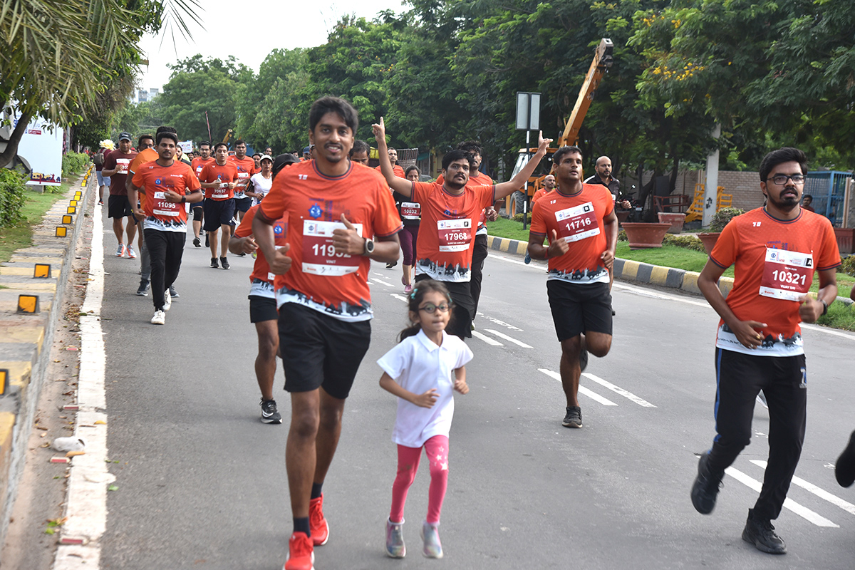 The half marathon ended at Gachibowli Stadium - Sakshi26