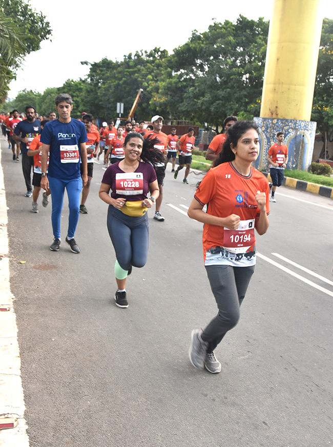 The half marathon ended at Gachibowli Stadium - Sakshi27
