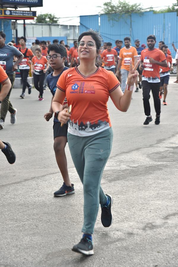 The half marathon ended at Gachibowli Stadium - Sakshi29