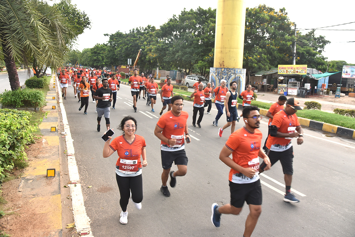 The half marathon ended at Gachibowli Stadium - Sakshi4