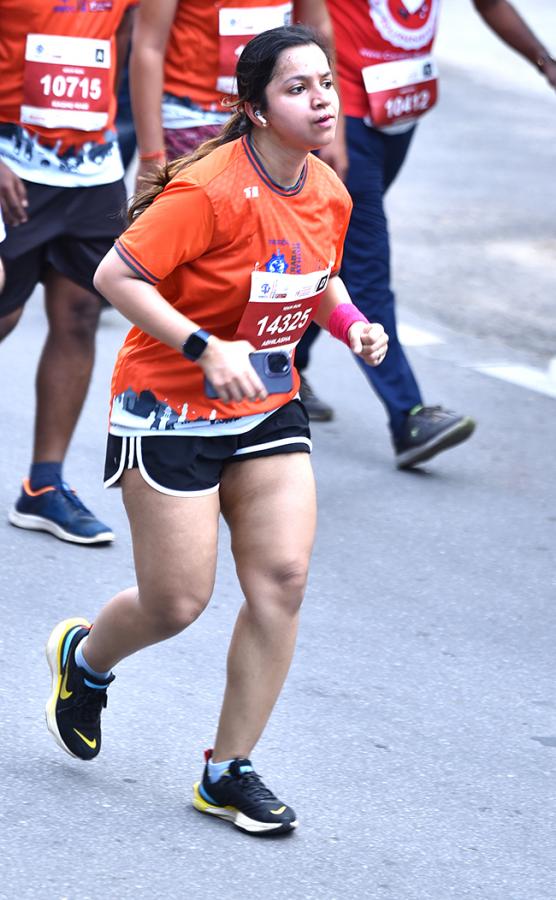 The half marathon ended at Gachibowli Stadium - Sakshi8