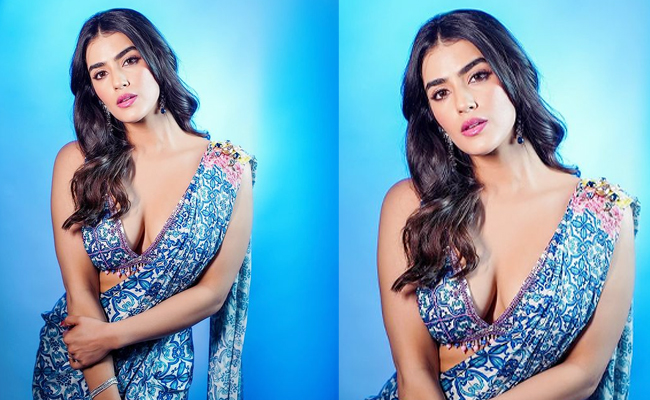 Kavya Thapar Raises Heat In Blue Saree Photos - Sakshi1