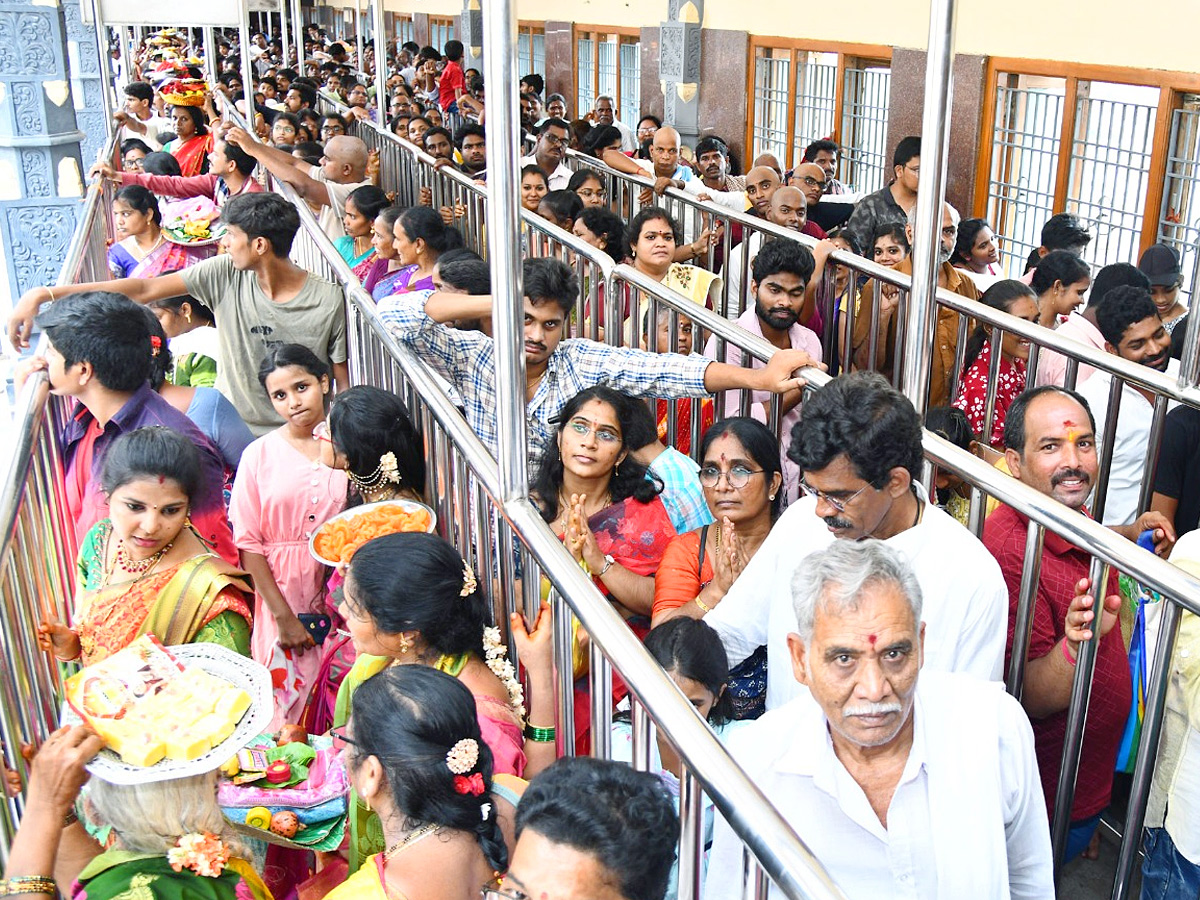 Ashada Masam Devotees Huge Crowd To Durga Temple In Vijayawada Photos13