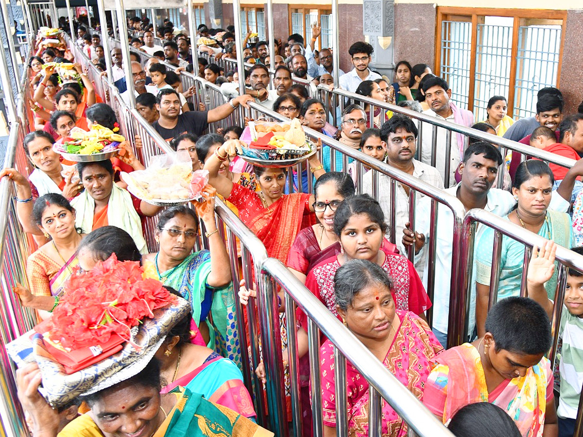 Ashada Masam Devotees Huge Crowd To Durga Temple In Vijayawada Photos14