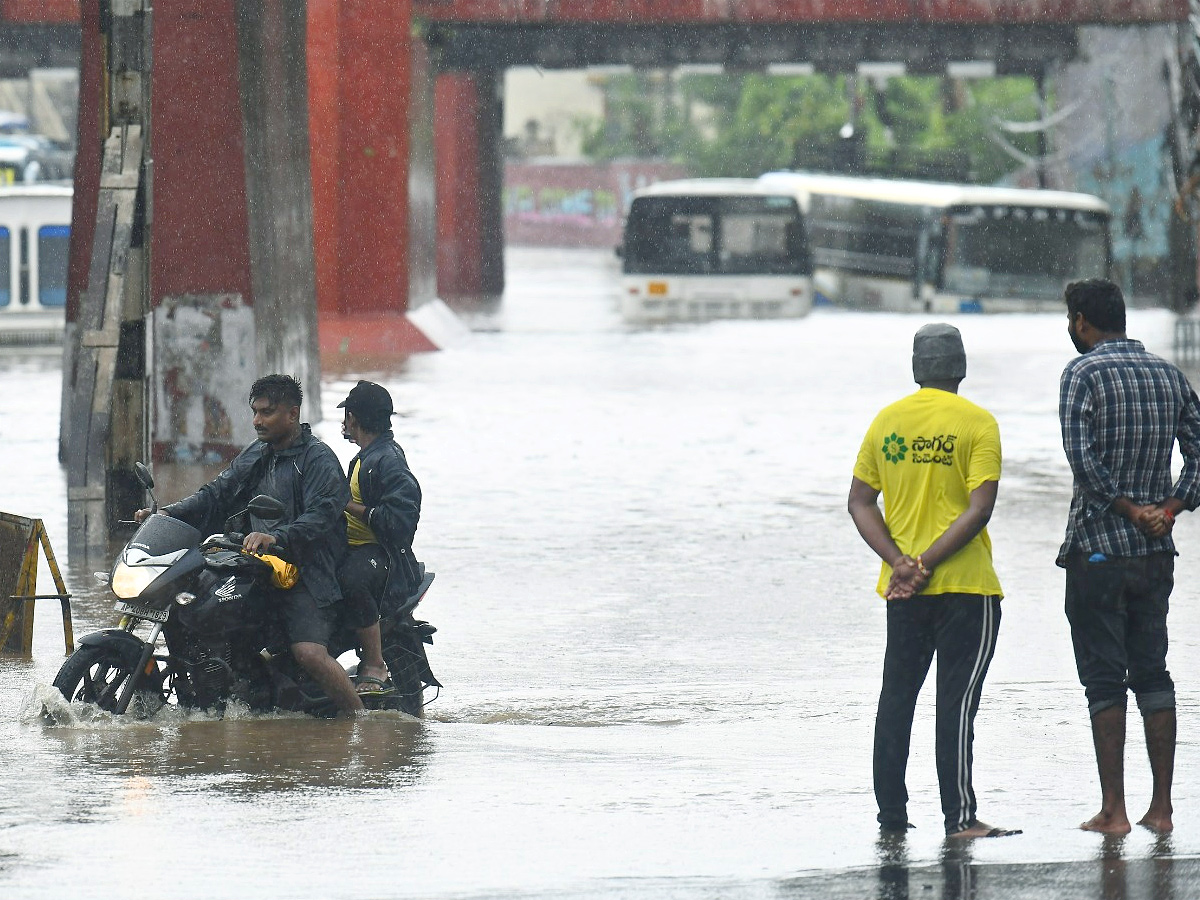 Heavy rains cause disruption in several parts of Andhra Pradesh Photos4