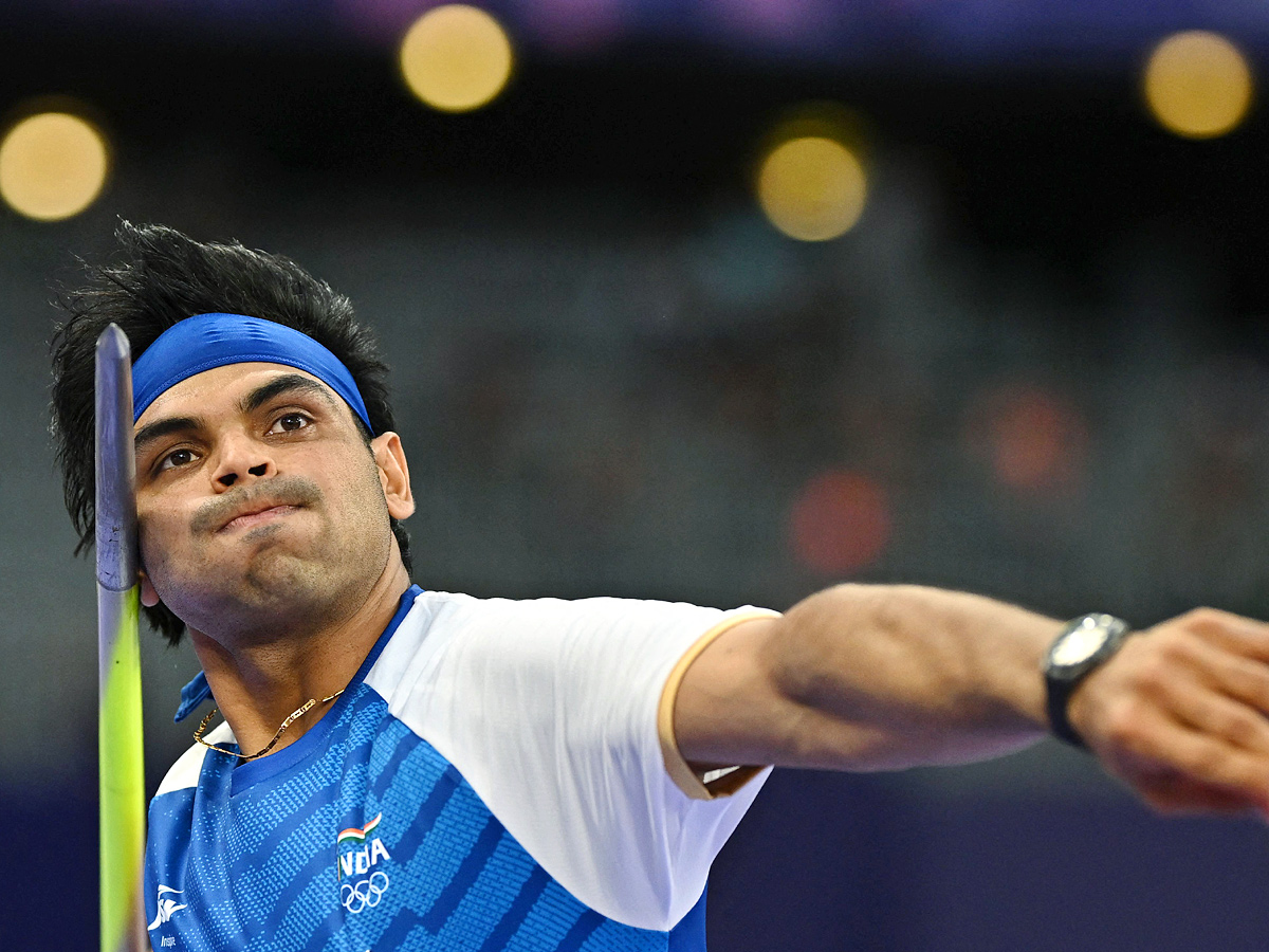 Neeraj Chopra wins silver in mens javelin, India bag hockey bronze Photos12