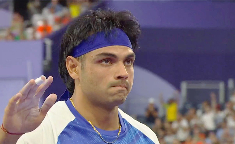 Neeraj Chopra wins silver in mens javelin, India bag hockey bronze Photos5
