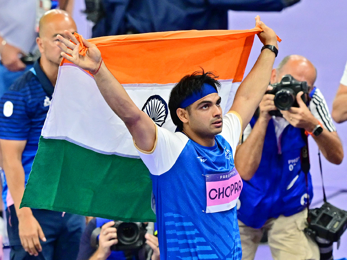 Neeraj Chopra wins silver in mens javelin, India bag hockey bronze Photos1