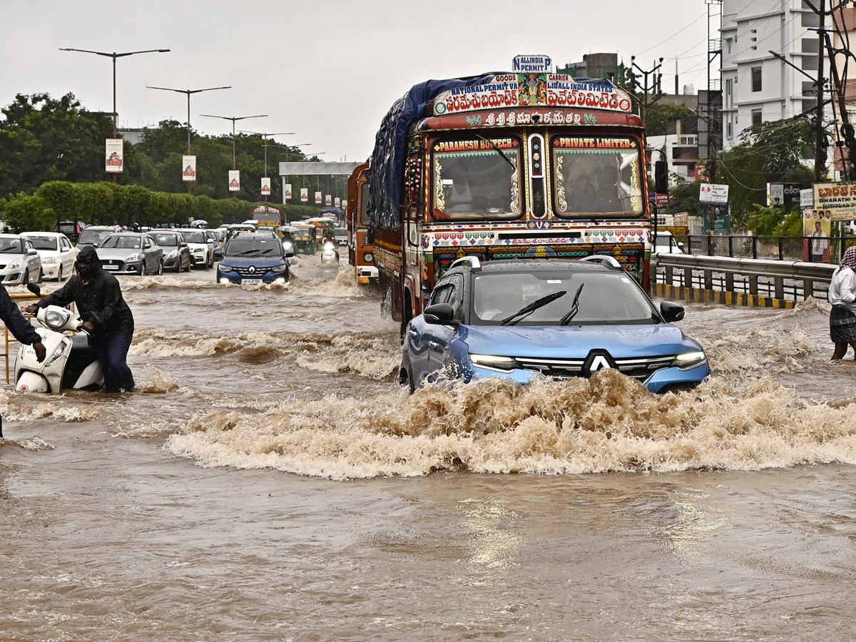Heavy Rains And Floods In Vijayawada Photos Viral11