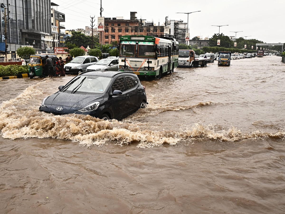 Heavy Rains And Floods In Vijayawada Photos Viral15