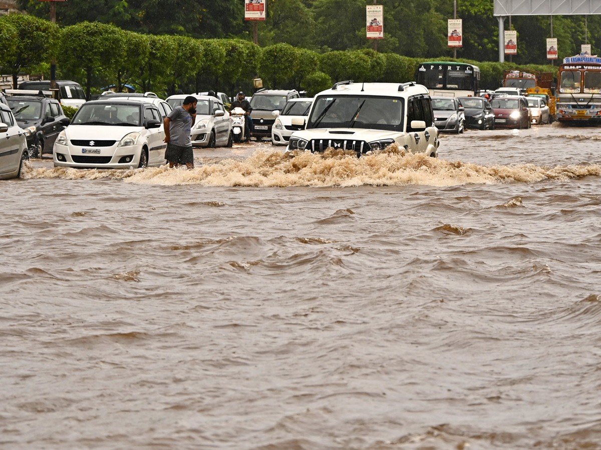 Heavy Rains And Floods In Vijayawada Photos Viral16