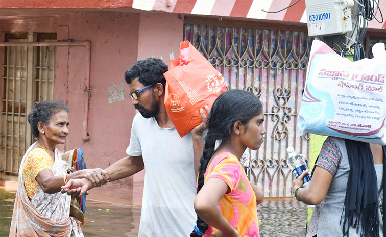 Vijayawada Continues To Suffer From Heavy Rainfall And Waterlogging Photos14