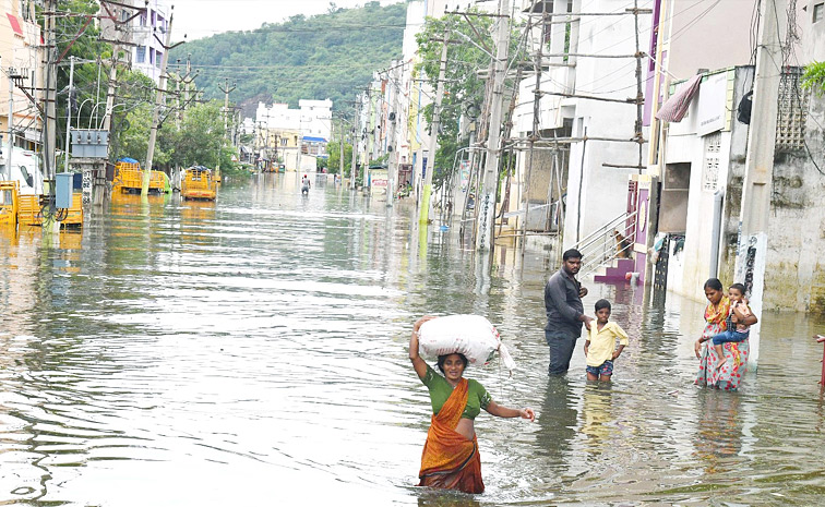 Vijayawada Continues To Suffer From Heavy Rainfall And Waterlogging Photos26