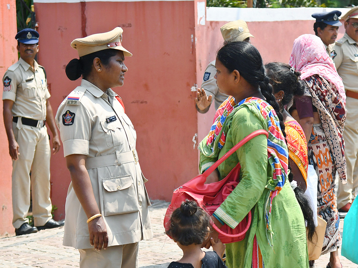 Vijayawada flood victims gathered outside the collector's office photo gallery. [node:summary]2