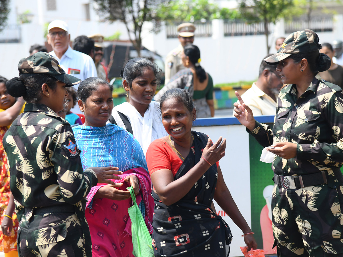 Vijayawada flood victims gathered outside the collector's office photo gallery. [node:summary]3