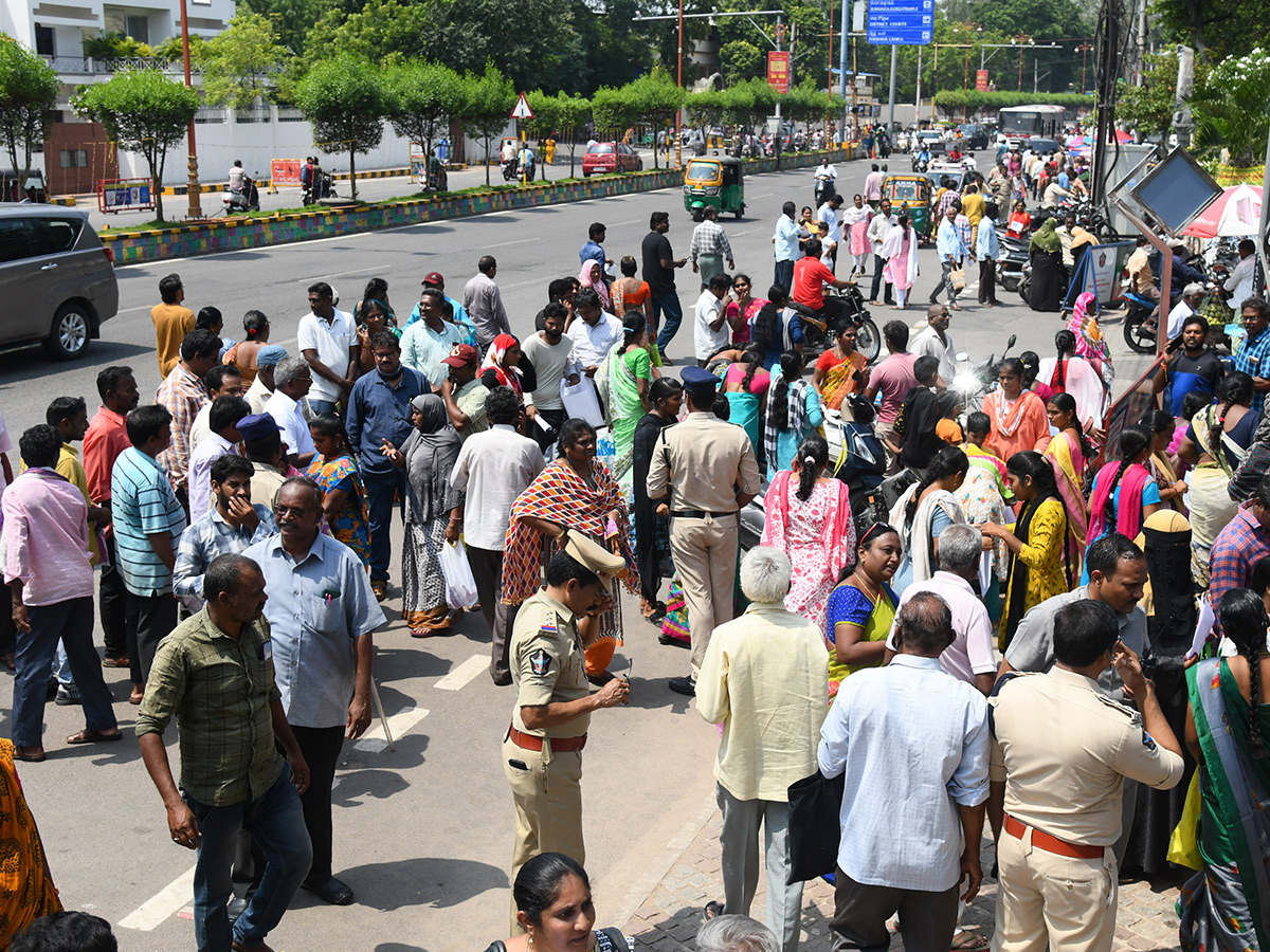 Vijayawada flood victims gathered outside the collector's office photo gallery. [node:summary]6