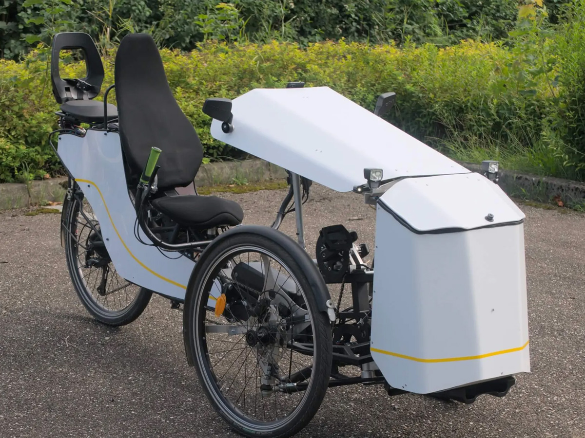 Semi-enclosed recumbent e-trike splits the difference between bike and car Photos2