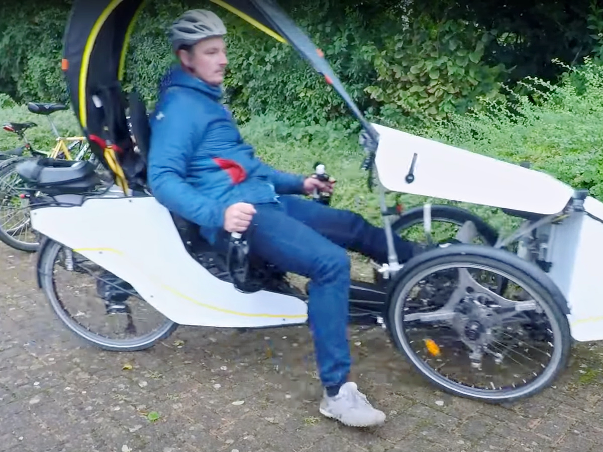 Semi-enclosed recumbent e-trike splits the difference between bike and car Photos8