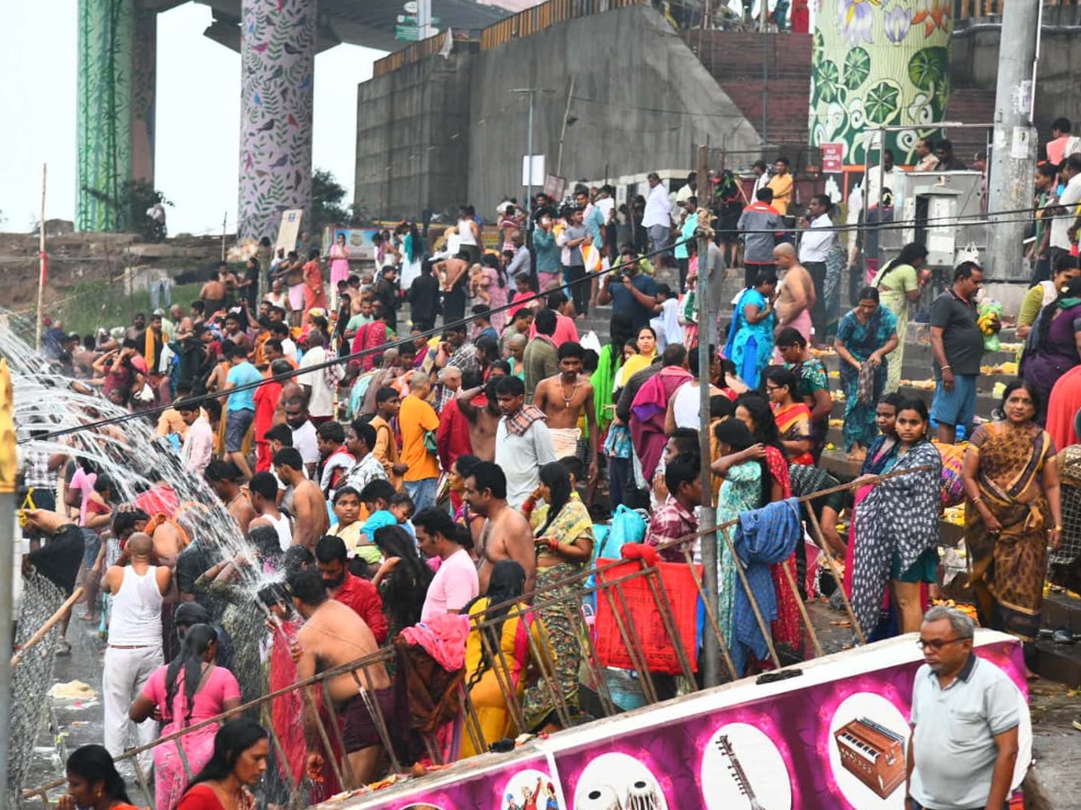 Devotees Rush At Vijayawada Punnami Ghat To Offer Karthika Masam Prayers10