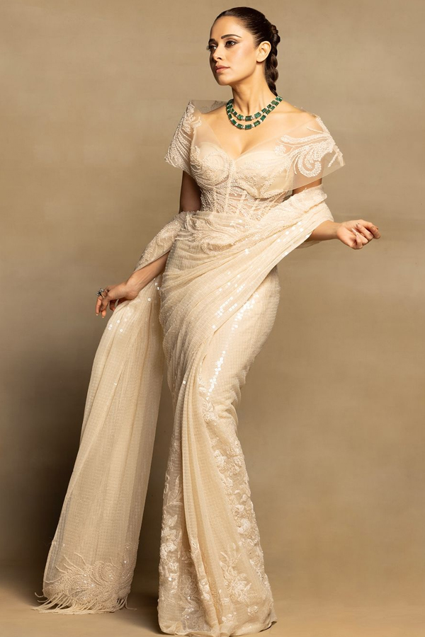 Bollywood Beauty Nushrratt Bharuccha Stunning Photos In White Saree3